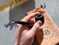 smoking tobacco in a wooden pipe mrbrog