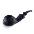 smoking tobacco in a wooden pipe