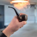smoking tobacco in a traditional pipe