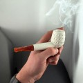 Smoking tobacco in a collectible pipe