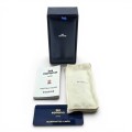 Corona Old Boy lighter, packaging, and warranty card