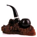 pipe on a stand made of natural bark